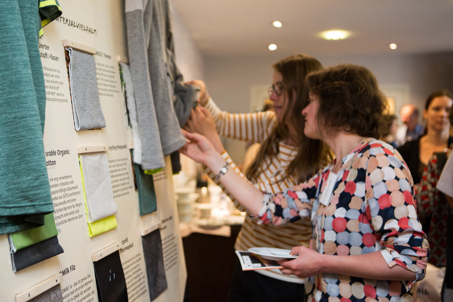 Display with alternative (biobased and recycled) materials from the VAUDE Green Shape Core Collection at the TextileMission Conference, May 2018  